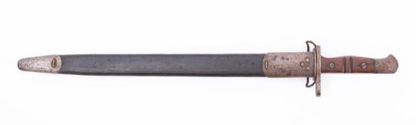 A WWI period 1907 pattern bayonet and scabbard by Remington: the straight fullered blade stamped as
