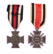 A German Cross of Honour: stamped RV25 with Ribbon, together with a Cross of honour with Swords,