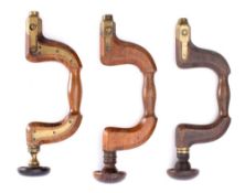 Three brass mounted beech braces: (3)