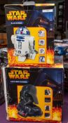A Star Wars Darth Vader telephone in original box: together with a Star Wars R2D2 telephone in