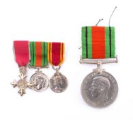 An O.B.E. miniature group of three medals: includes O.B.