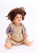An mid 20th century bisque head doll by Heubach Koppelsdorf: applied wig, blue glass sleeping eyes,