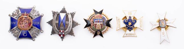 A collection of Polish metal and enamel Regimental association badges: includes 1st U8 Regiment,