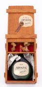 A bottle of 1918 Armagnac Michel Faure: 70 cl, 40% in a wooden case.