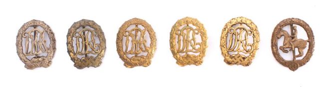 A collection of German Third Reich style DRA and DRL Sports Medals: including bronze,