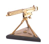 A brass trench art style model of a Vickers MK.1 .