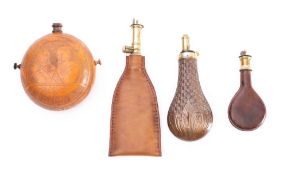 Two leather and brass shot flasks: together with a copper and brass powder flask and an engraved