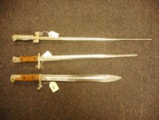 A WWI period German S84/98 bayonet: together with a French 1886 Lebal pattern bayonet and a