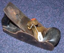 An unsigned smoother: with mahogany infill and closed handle, Marples & Son iron.