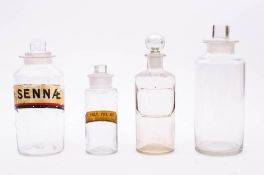 A small collection of various pharmaceutical jars and bottles: including several with gilt labels