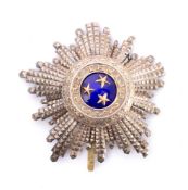 Latvian Star to the Order of The Three Stars: with enamel blue centre with three stars enclosed by