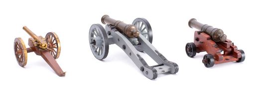 Two 8 inch bronze cannon barrel on reproduction carriages: one a Royal Navy pattern carriage,