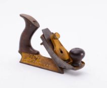 A Stanley No. 72 chamfer plane: overpainted yellow.