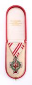 An Austro-Hungarian Red Cross Medal: contained in original case of issue.