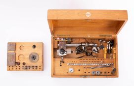 An oak cased Boley watchmakers lathe: 8 mm type with accessories in a fitted case (incomplete)