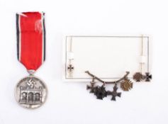 A replica Third Reich Blood Order: together with a collection of WWI German stick pins including