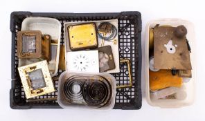 A group of various brass carriage clock cases and parts, together with a small collection of tools.