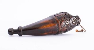 A late 18th /early 19th century carved wood screw holder: the neck decorated with an array of