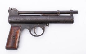 A Webley MKI .22 calibre air pistol: serial number '21052', two piece wooden grip.