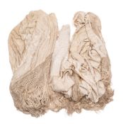 Three late Victorian /early Edwardian cream silk shawls: with floral embroidered decoration and