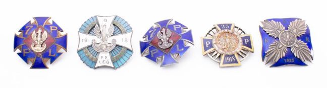 A collection of Polish metal and enamel Regimental association badges: includes,