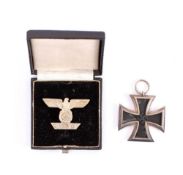 A reproduction WWII Iron cross and Iron Cross Clasp in box of issue: (2) * Notes Militaria