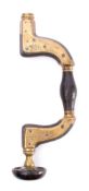 A brass button pad 'Ultimatum Framed Brace' by Marples & Son, Hibernia: with ivory ring to pad.