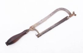 A 19th century steel frame hand saw,
