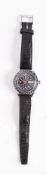 A Swiss Computer analogue Pilot's watch: black dial, luminous batons with Arabic 12, 6 and 9,