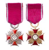 A Polish silver gilt Cross of Merit : stamped Spinks, London, silver to the reverse,