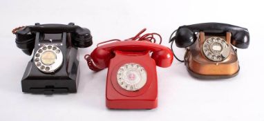 A mid 20th century GPO black Bakelite telephone: with plated rotary dial and exchange button,