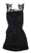 An early 20th century black lace and silk beadwork dress: