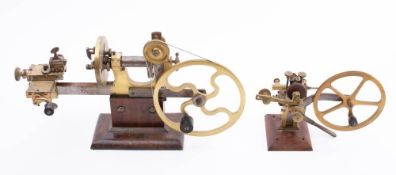 A 19th century lacquered brass watch/clock maker's lathe: the 9 inch spoked hand turned flywheel