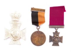 A replica Victoria Cross: a replica Eire General Service Medal and a replica The Kings Royal Rifle