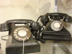 A GPO No 162 black Bakelite telephone on a No 25 bell set base: together with a British Post Office