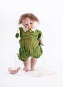 An Armand Marseille, bisque head doll: applied brown wig , blue glass sleeping eyes,