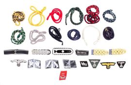 A small group of reproduction German military bullion loops and cloth badges etc.