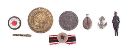 A collection of replica and Third Reich period German awards,