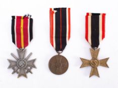 A Third Reich period War Service Cross 2nd class with swords: a War Service Cross,