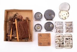 A collection of fishing reel and equipment: comprising two Army & Navy fly reels, an Allcock,