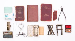 A small collection of various pharmaceutical items: comprising a brass suppository mould,