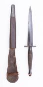 A WWII Second pattern Fairbairn Sykes Fighting knife: the straight double edge blade over 2 inch