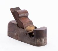 A parallel smoothing plane: unsigned , mahogany infill and scrolled wedge, stamped 'H J Thomas'.
