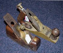 An unsigned smoother: with mahogany infill and Charles Taylor iron,
