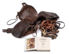 A 1912 pattern Cavalry/Yeomanry brown leather saddle: together with a set of Infantry Mounted