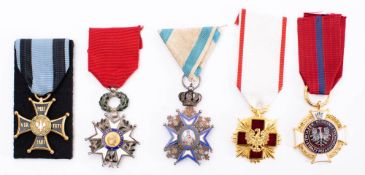 A Polish war Order of Militari Virtuti: two other Polish medals,
