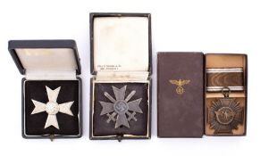 A Third Reich period War Service Cross 1st class with swords: cased,