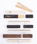 A cased slide rule A W Faber: together with two other cased slide rules and an uncased Castell