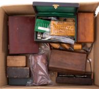 A group of various clock and watchmaking tools and accessories in cases and loose: including a