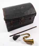 An early 20th century leather and wicker dome topped travelling trunk: initialed 'E.M.
